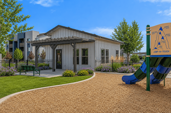 Playground with clubhouse and gravel play area